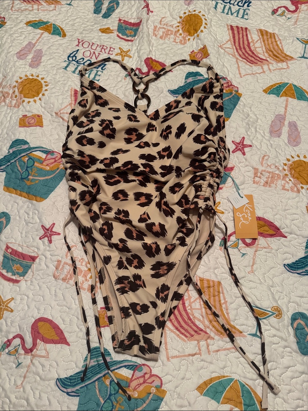 NWTKona Sol Leopard Print One-Piece Bodysuit in Beige with Brown and Black Spots
